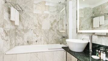 Deluxe Room | Bathroom | Hair dryer, towels