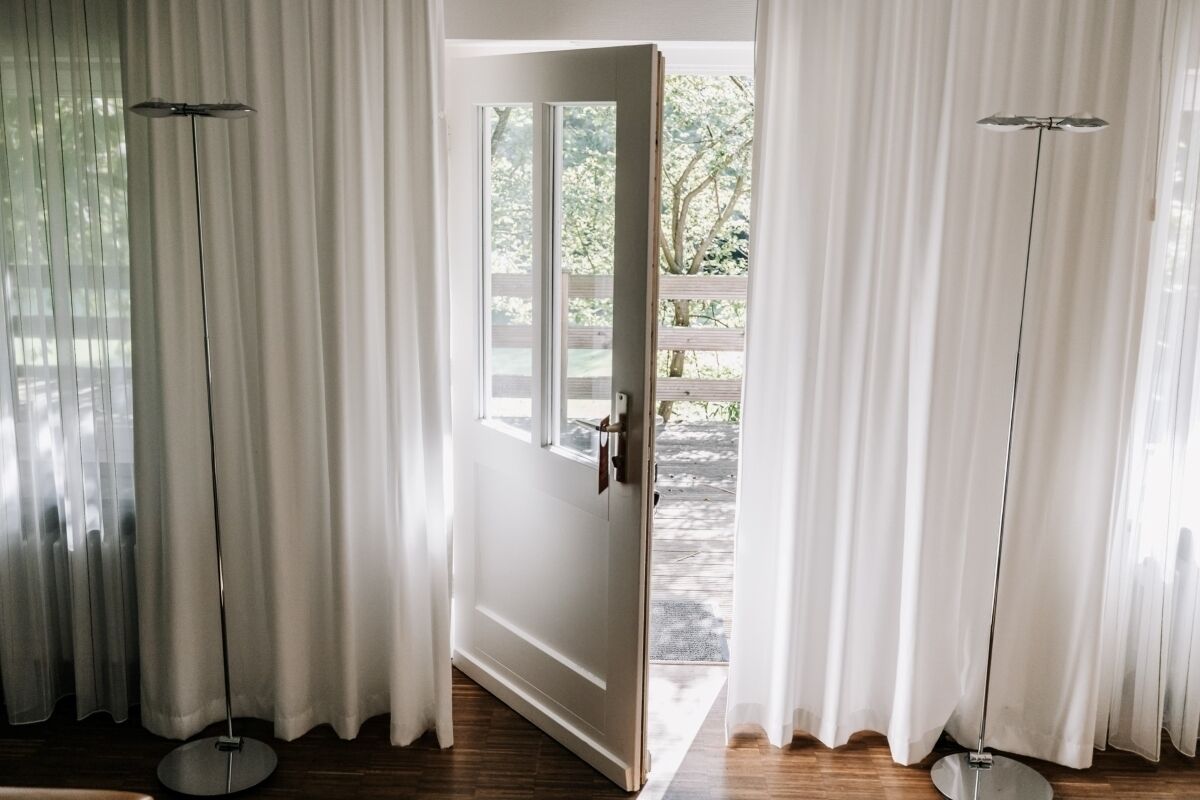 Deluxe Cabin, Terrace, Lake View | Living area | 27-inch flat-screen TV with satellite channels, TV