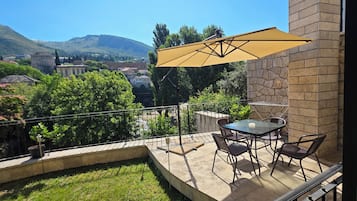 Deluxe Apartment, River View | Terrace/patio