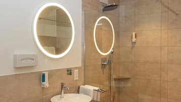 Deluxe Suite, Mountain View | Bathroom | Separate tub and shower, jetted tub, rainfall showerhead