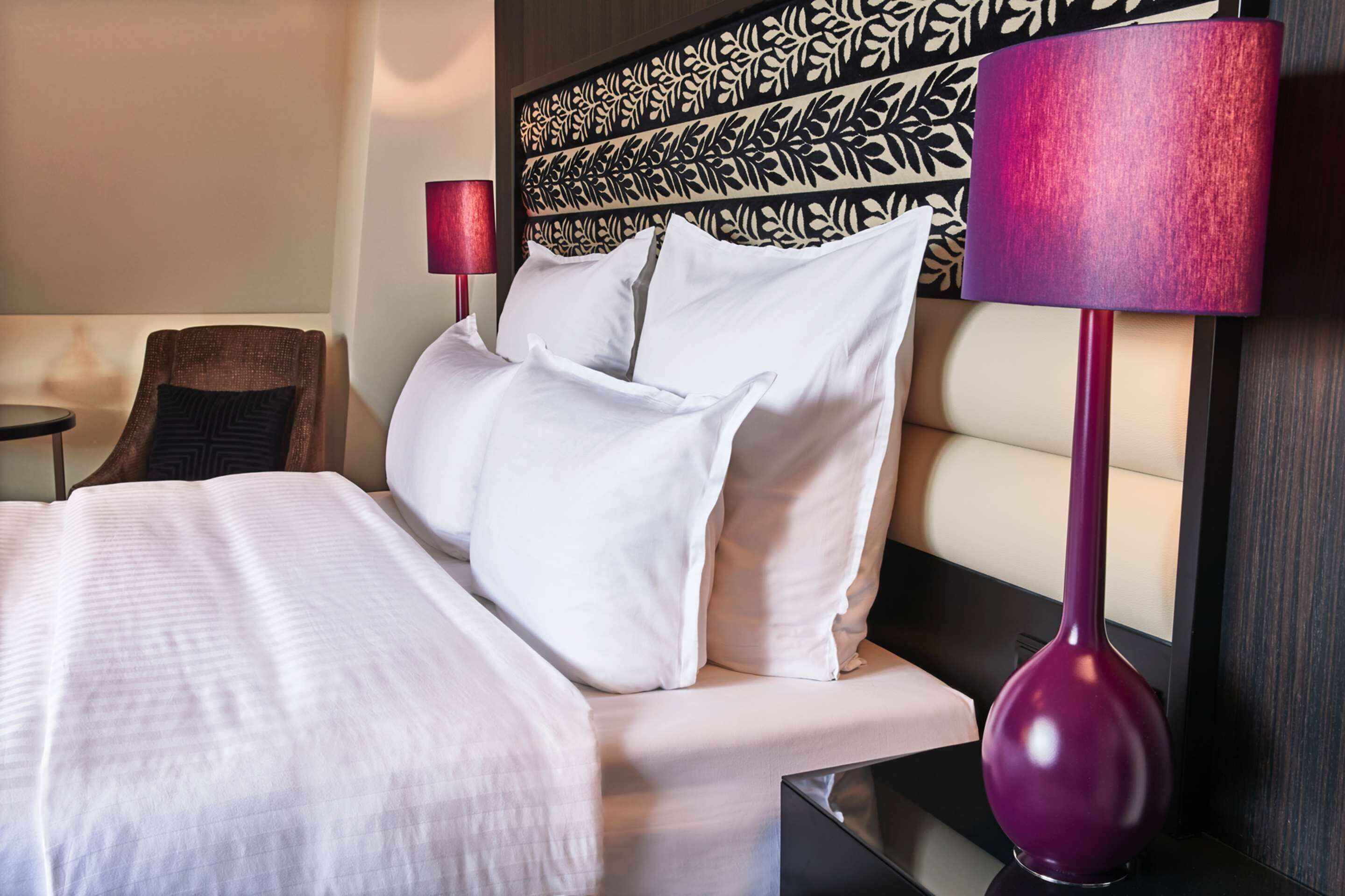 Premium bedding, down duvets, minibar, in-room safe