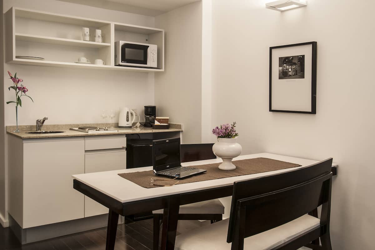 fridge, microwave, coffee/tea maker, cookware/dishes/utensils