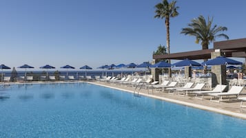 3 outdoor pools, open 10 AM to 6 PM, pool umbrellas, pool loungers
