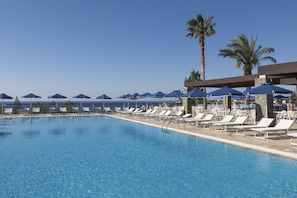 3 outdoor pools, open 10 AM to 6 PM, pool umbrellas, sun loungers