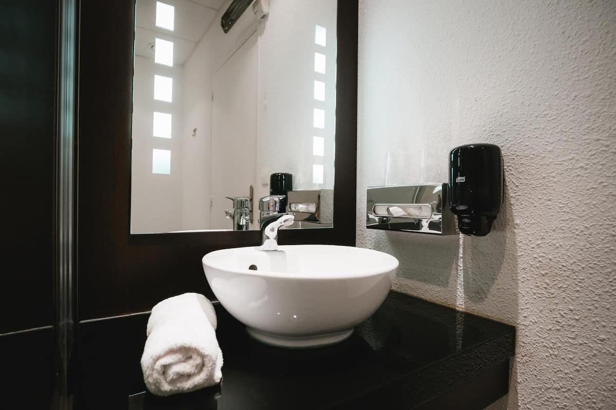 shower, rainfall showerhead, hair dryer, towels