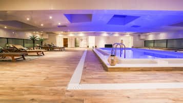 Indoor pool, open 9:00 AM to 8:30 PM, pool loungers