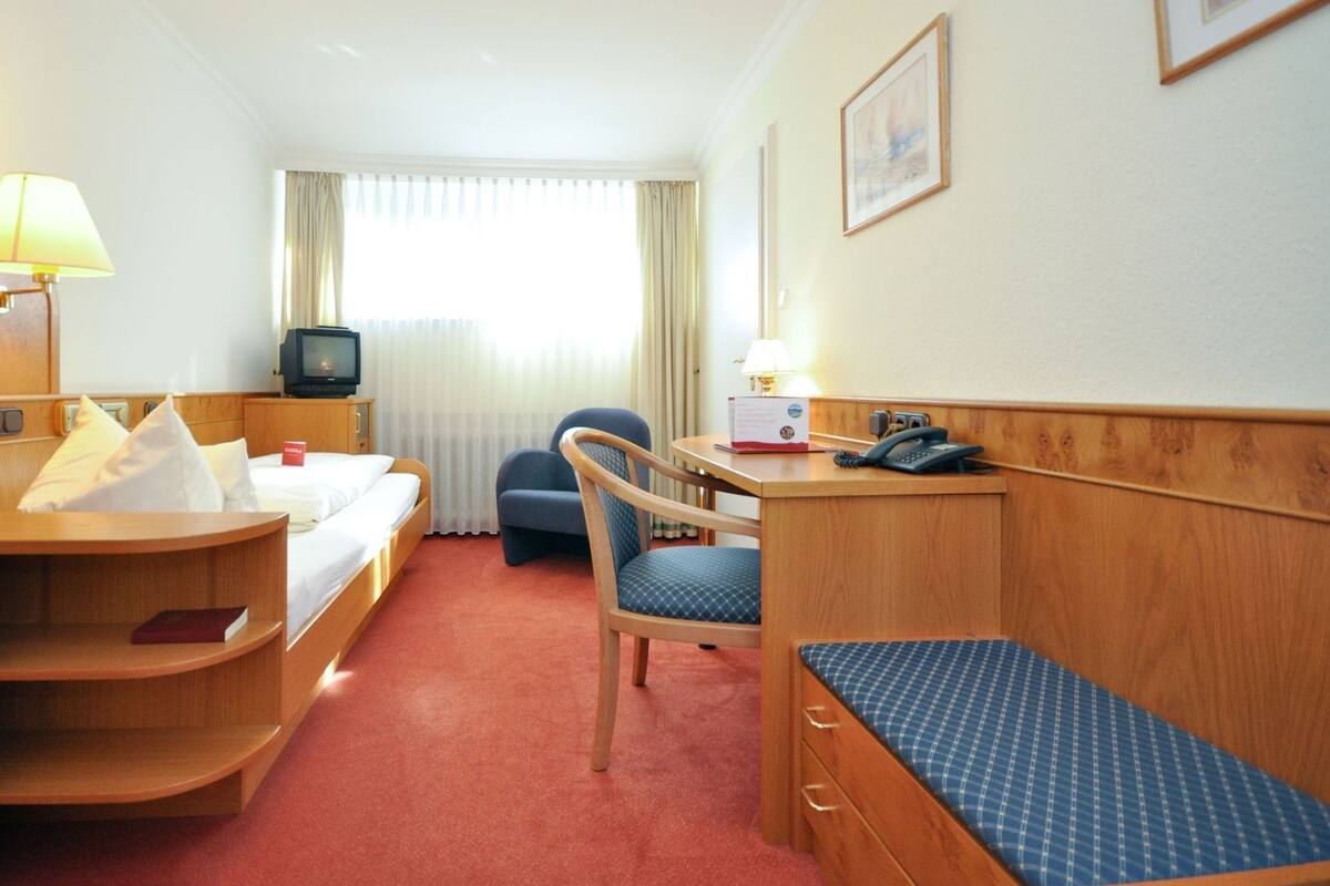 Room | Minibar, in-room safe, individually furnished, desk