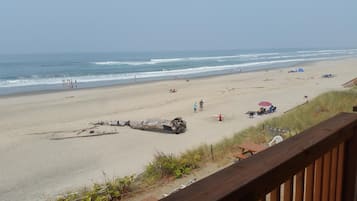 Enjoy the ocean views from the beach deck overlooking the sandy shore.