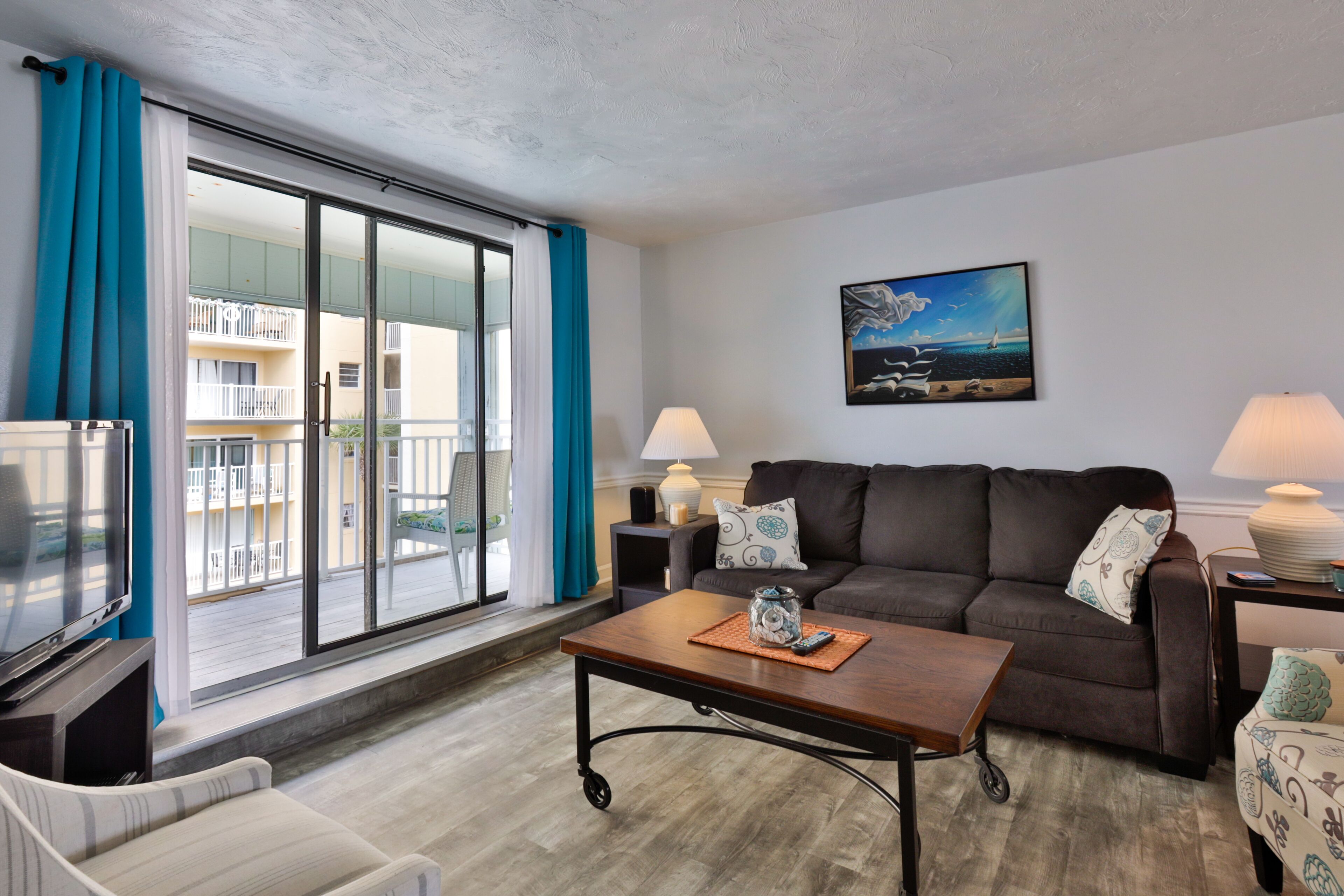 Suite, Kitchen, Oceanfront | Living area | 50-inch flat-screen TV with cable channels, TV