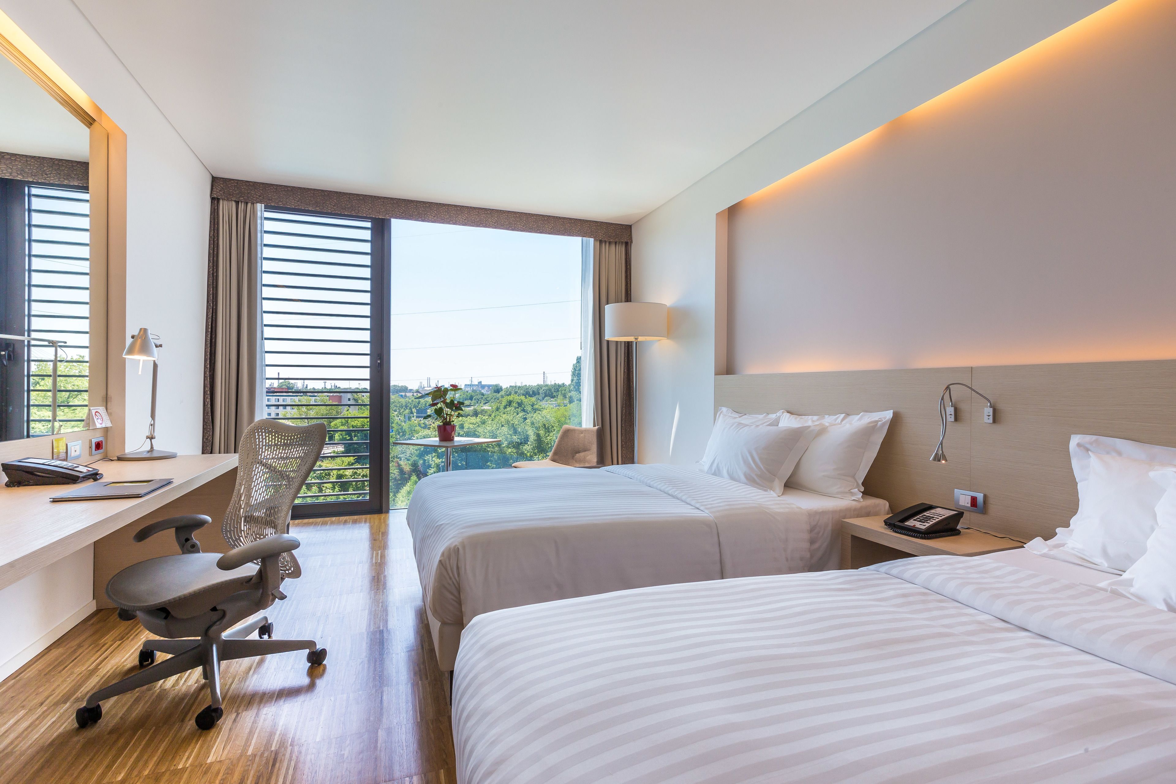 superior room, 2 queen beds | premium bedding, down duvets, in-room safe, desk