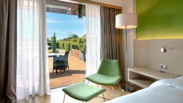 Superior Room, 1 King Bed, Balcony | Living area | 30-inch LCD TV with cable channels, TV, MP3 dock