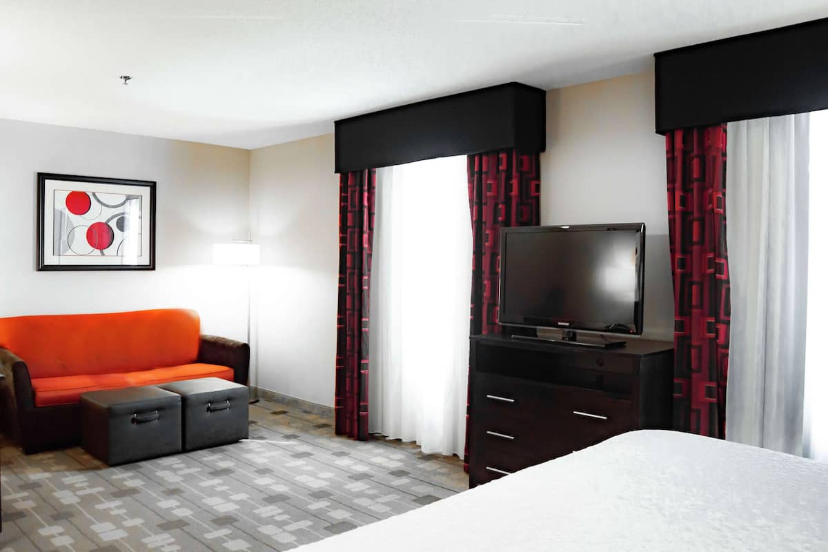 desk, laptop workspace, blackout curtains, iron/ironing board