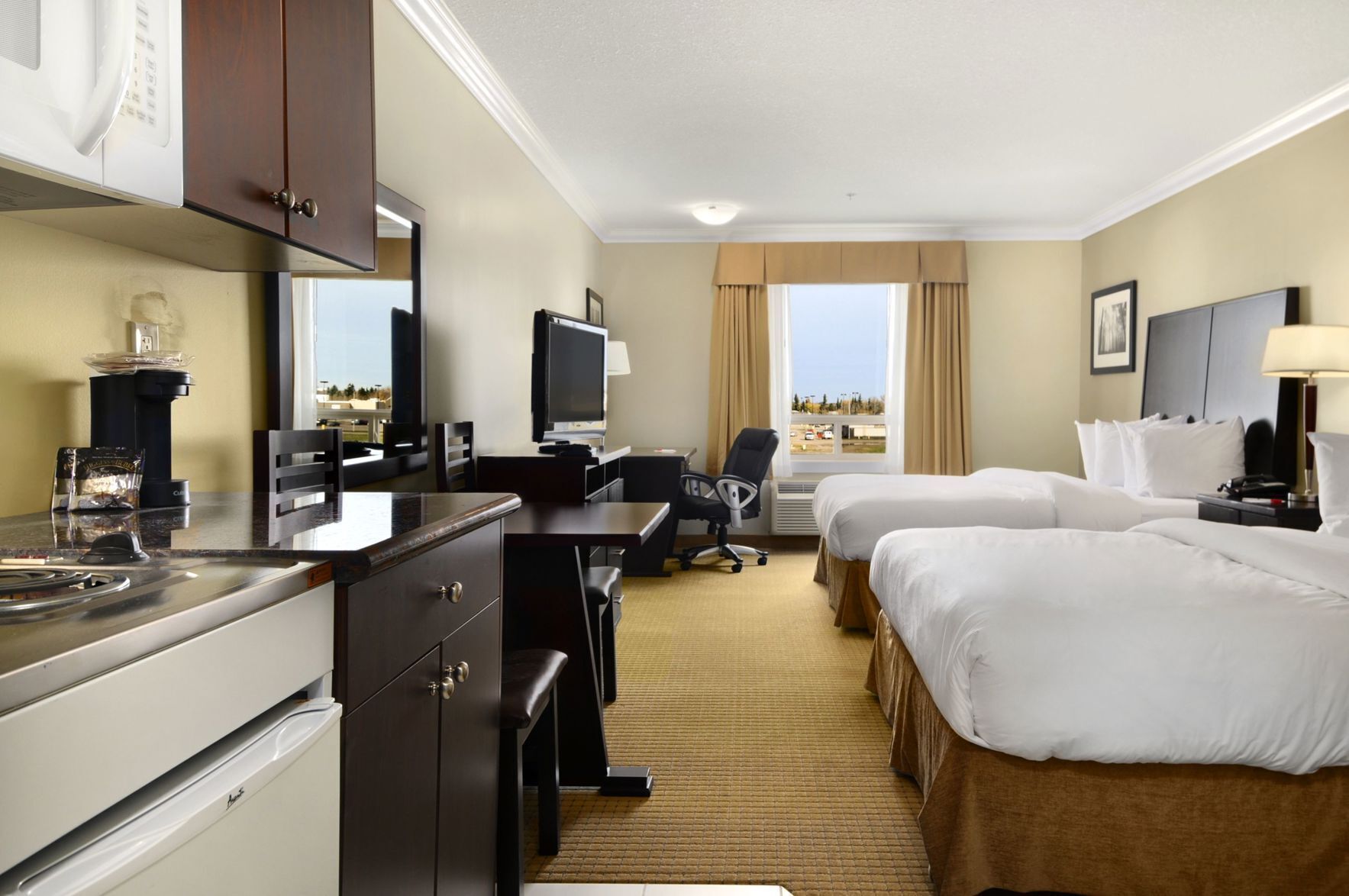 Premium bedding, pillowtop beds, minibar, individually furnished