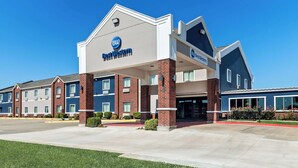 A Best Western hotel with a modern design, featuring a prominent 'BW' logo on the facade. - Best Western Halito Inn (Calera)