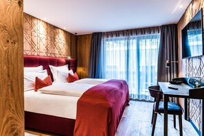 Hypo-allergenic bedding, down duvets, minibar, in-room safe