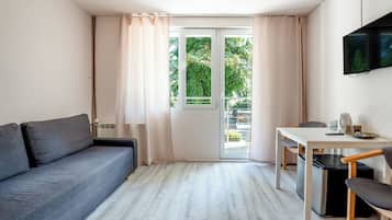 Apartment, 1 Bedroom | Living room | TV