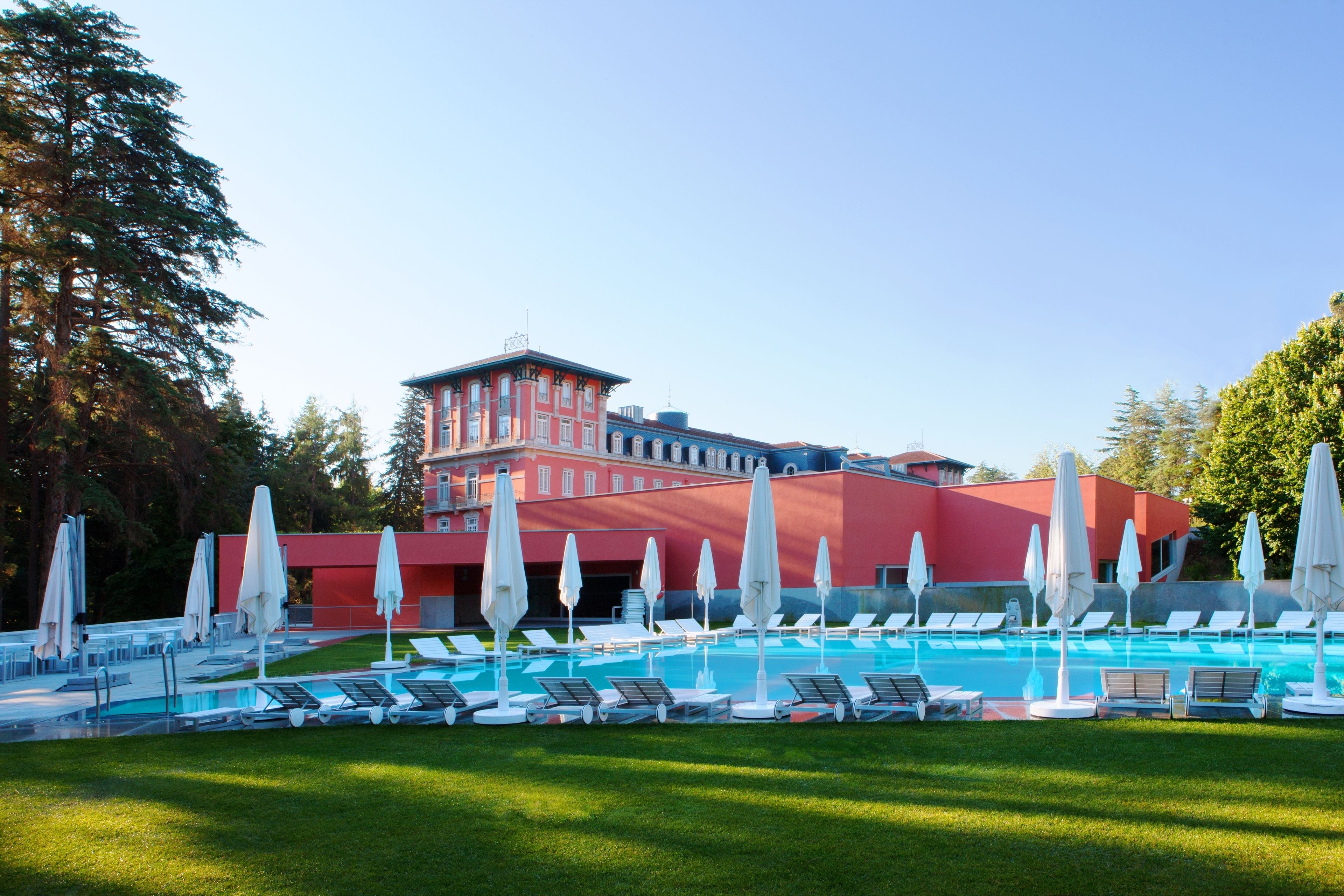 indoor pool, seasonal outdoor pool, pool umbrellas, pool loungers