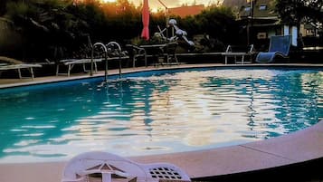 Outdoor pool, pool umbrellas, pool loungers