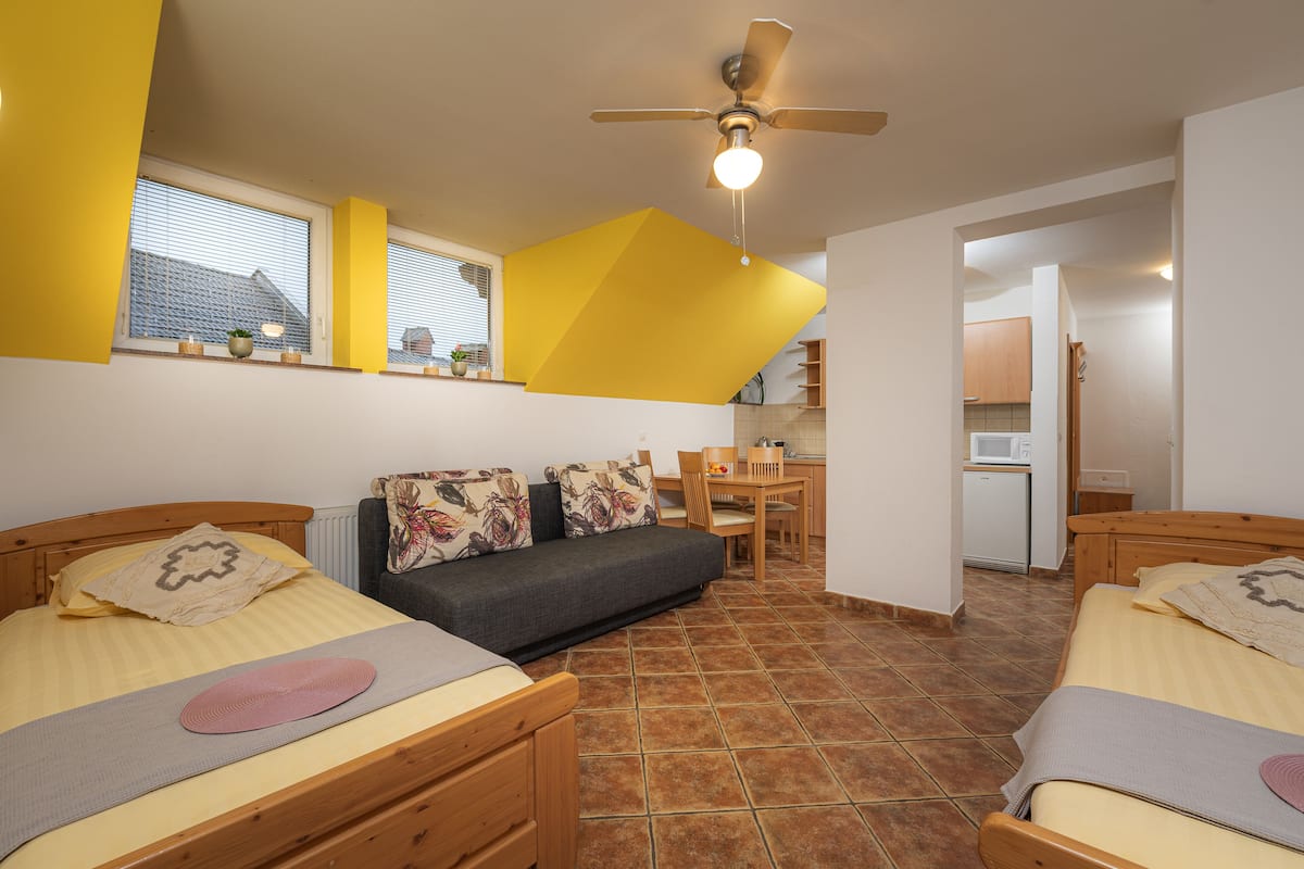 Comfort Apartment, 1 Bedroom, Balcony, Garden View | Living area | 52-cm flat-screen TV with digital channels, TV