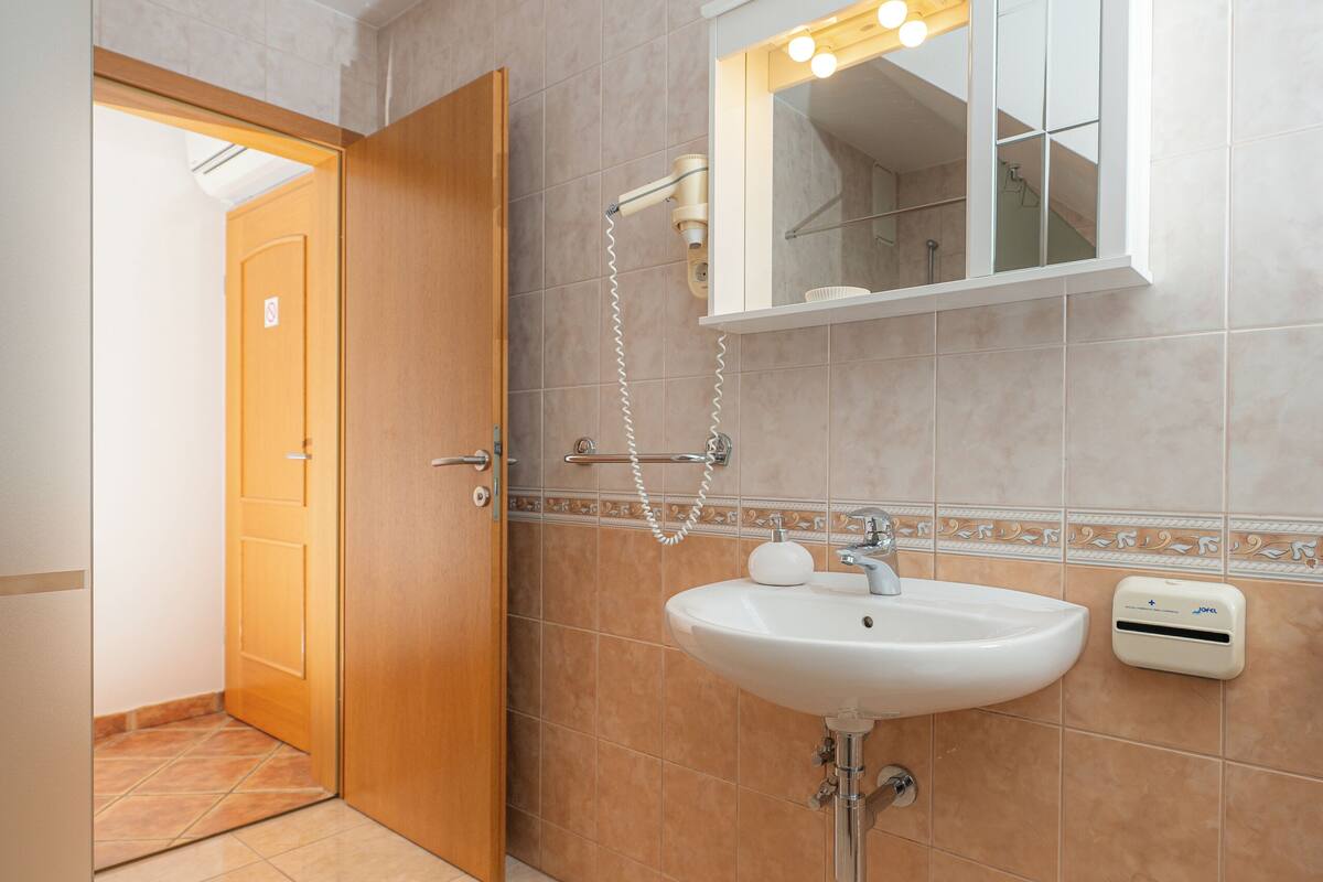 Comfort Triple Room, 1 Bedroom, Non Smoking, Balcony | 1 bedroom, desk, free WiFi, bed sheets