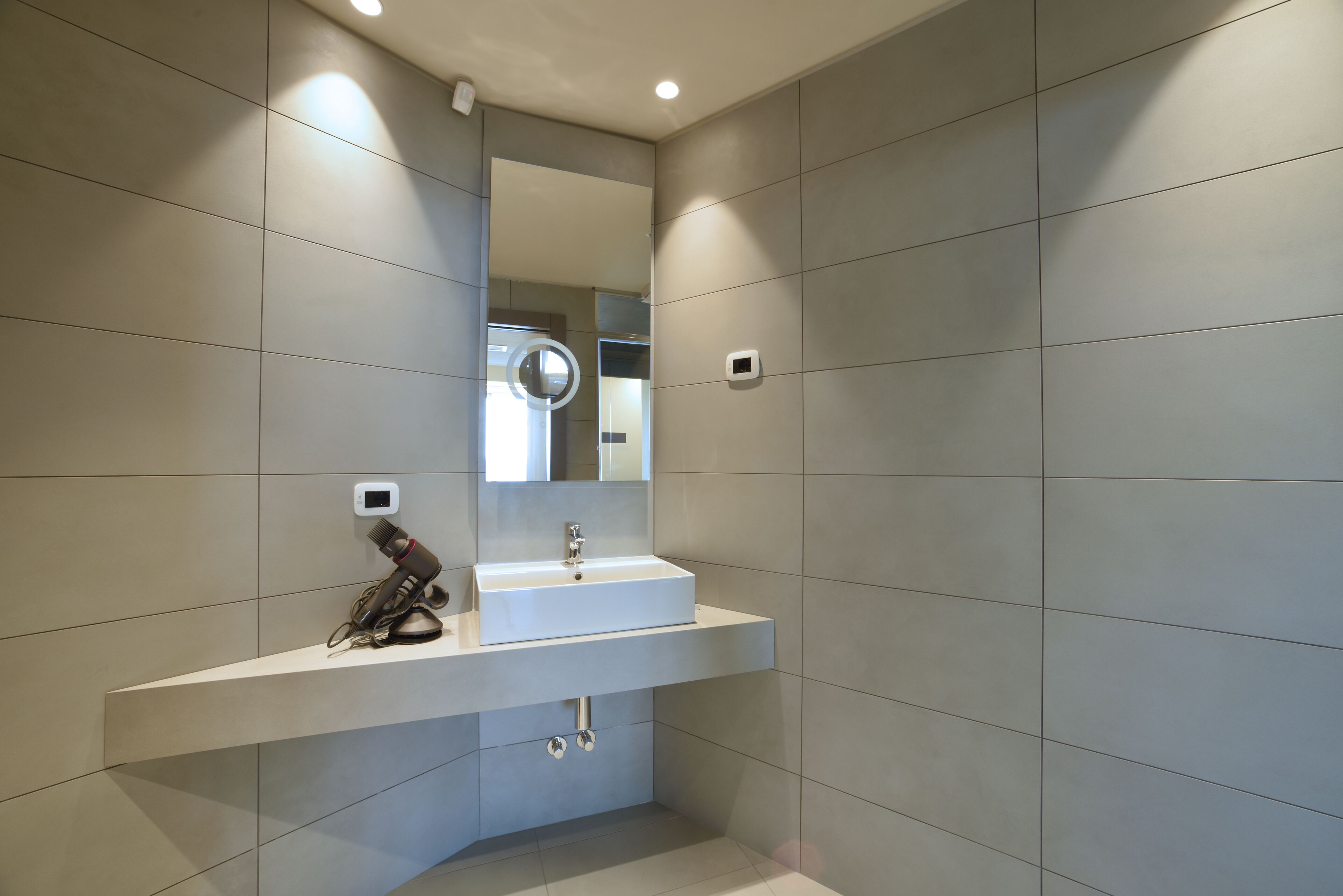 blu family vista mare | bathroom | shower, rainfall showerhead, hair dryer, bidet