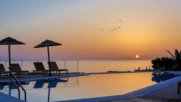 Outdoor pool, pool umbrellas, pool loungers