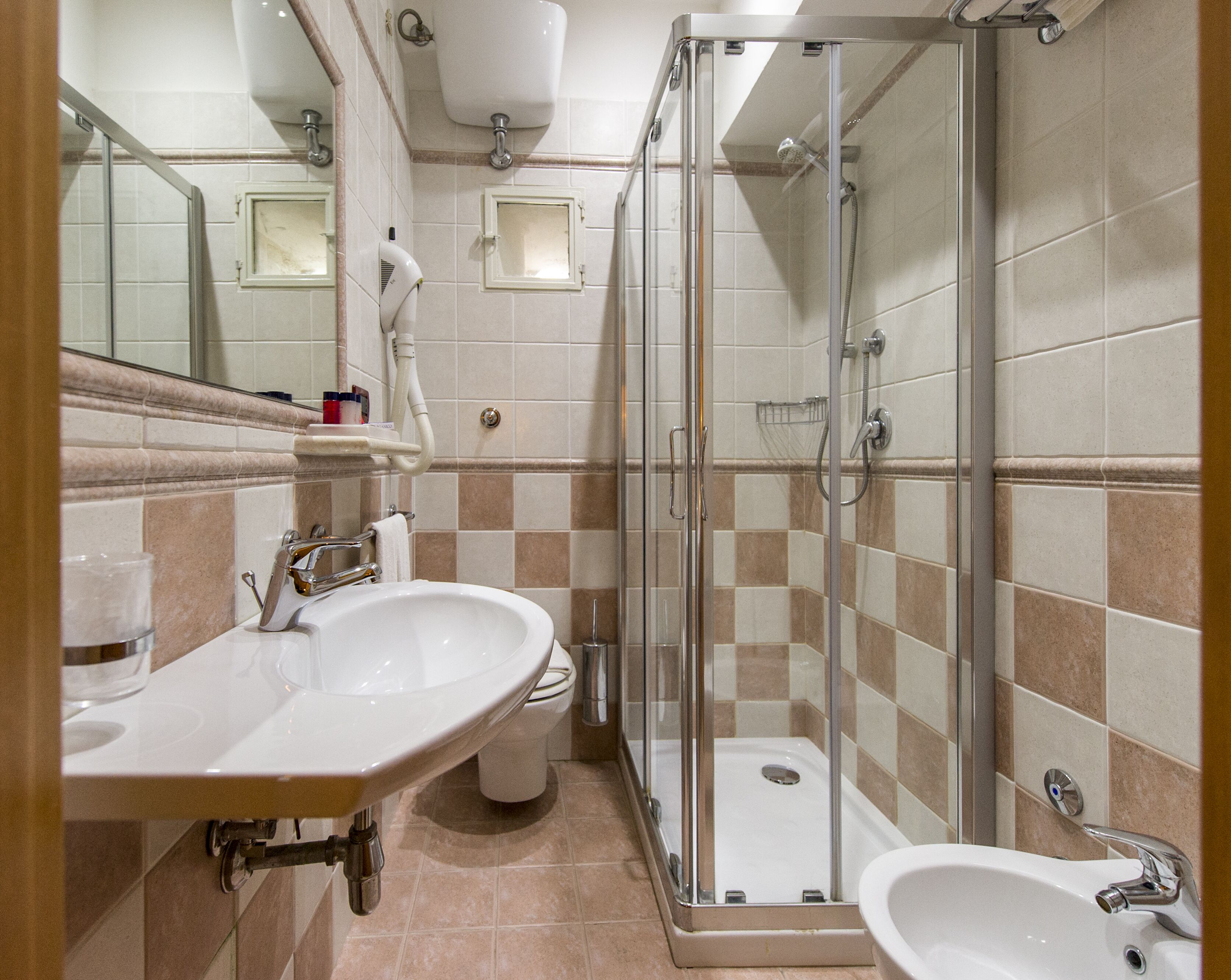 shower, free toiletries, hair dryer, towels