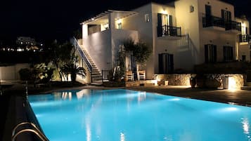 Outdoor pool, open 8 AM to 8 PM, pool umbrellas, sun loungers