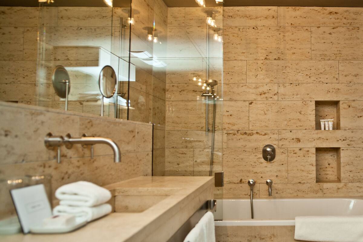 shower, free toiletries, hair dryer, slippers