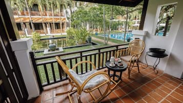 Premium Room, 1 King Bed, Balcony | Minibar, in-room safe, desk, blackout curtains