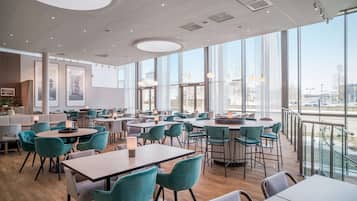 Breakfast, lunch, dinner served; international cuisine