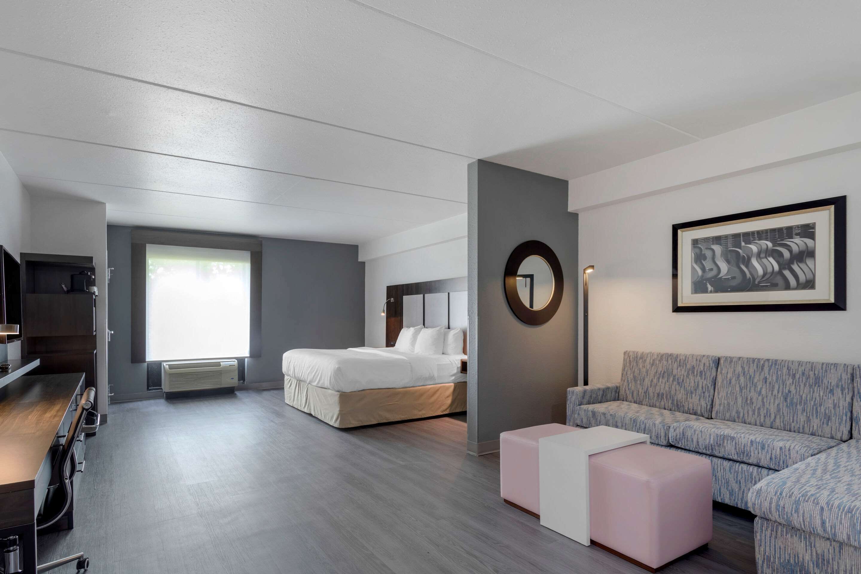 suite, 1 king bed with sofa bed, accessible, non smoking (roll-in shower) | premium bedding, pillow-top beds, in-room safe, desk