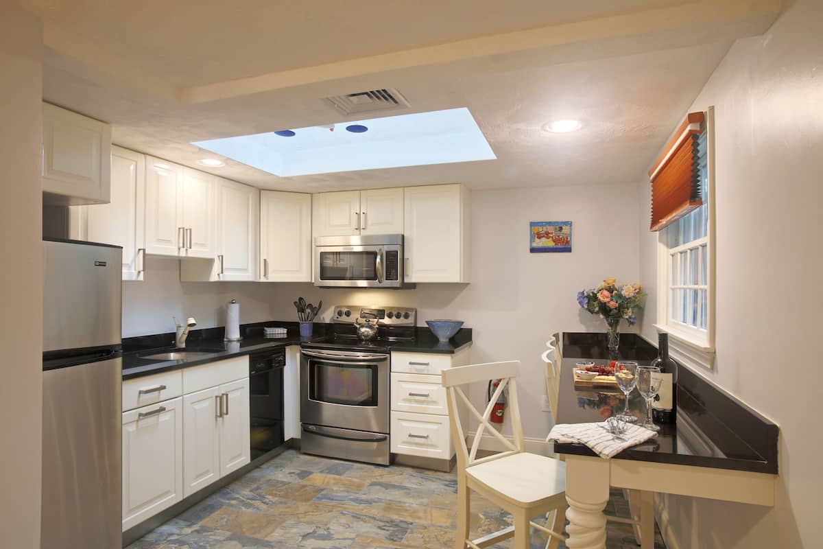 one bedroom cottage suite | private kitchen | fridge, coffee/tea maker