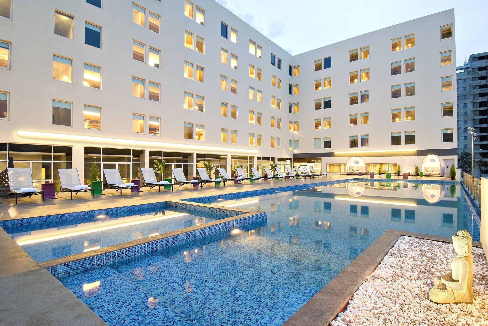 Outdoor pool, pool umbrellas, sun loungers