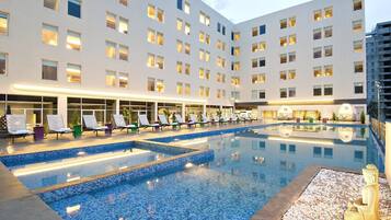 Outdoor pool, pool umbrellas, sun loungers