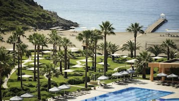 Indoor pool, outdoor pool, pool umbrellas, pool loungers