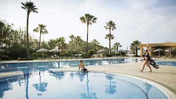 Indoor pool, outdoor pool, pool umbrellas, sun loungers