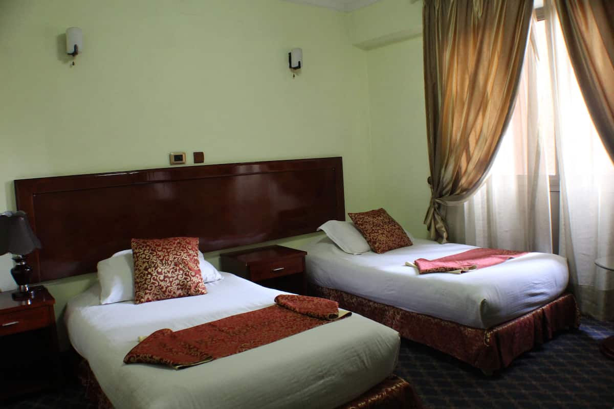 Standard Twin Room, 2 Twin Beds, Non Smoking | Minibar, in-room safe, free cribs/infant beds, free WiFi