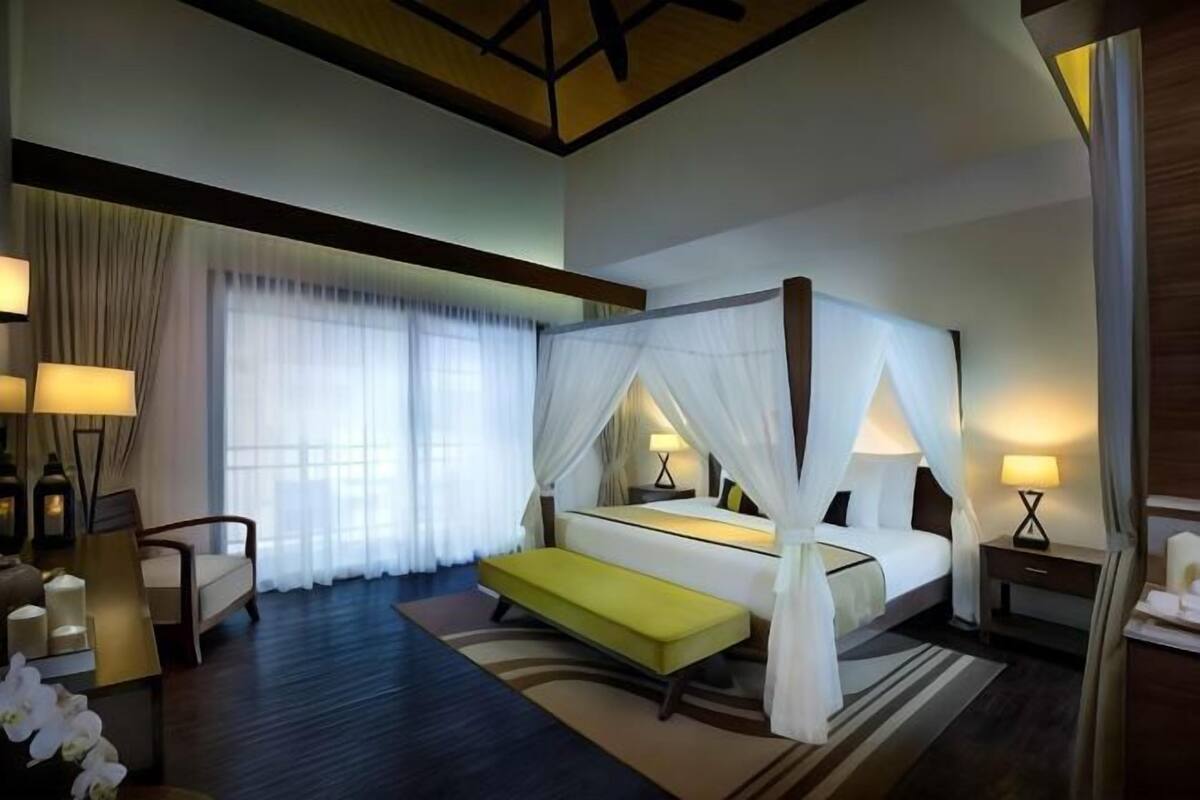 Luxe beddengoed, donsdekens, een kluis op de kamer