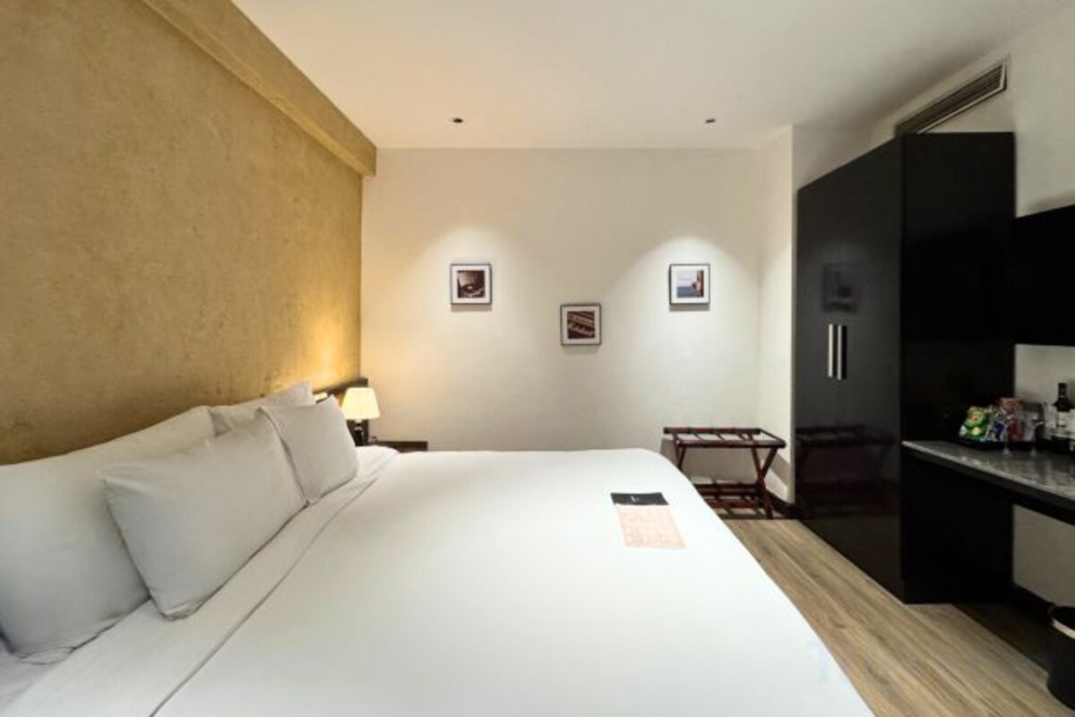 Pillow-top beds, minibar, in-room safe, desk