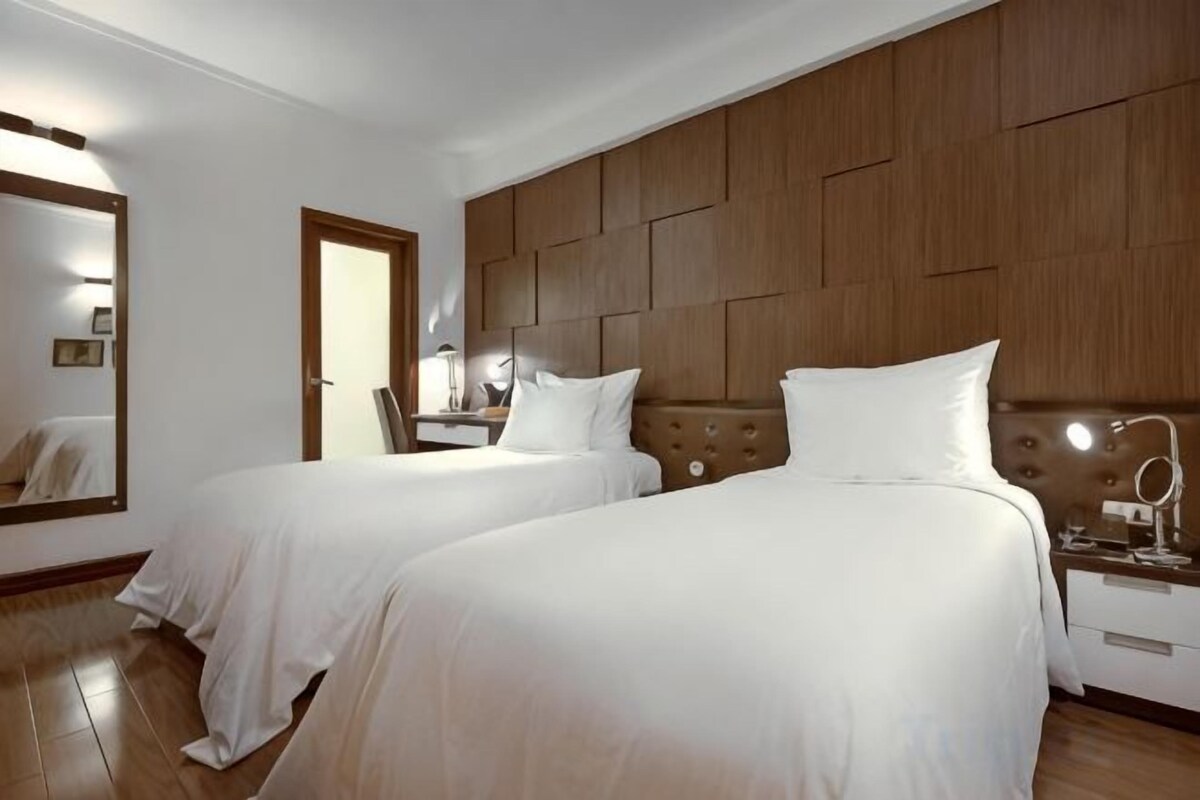 Pillow-top beds, minibar, in-room safe, desk