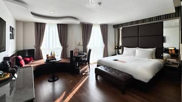 Colchones con pillow-top, minibar y caja de seguridad en la habitación