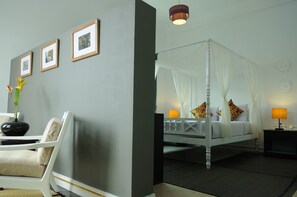 Deluxe Room, 1 King Bed | Premium bedding, minibar, in-room safe, individually decorated - Frangipani Villa Hotel II (Siem Reap)