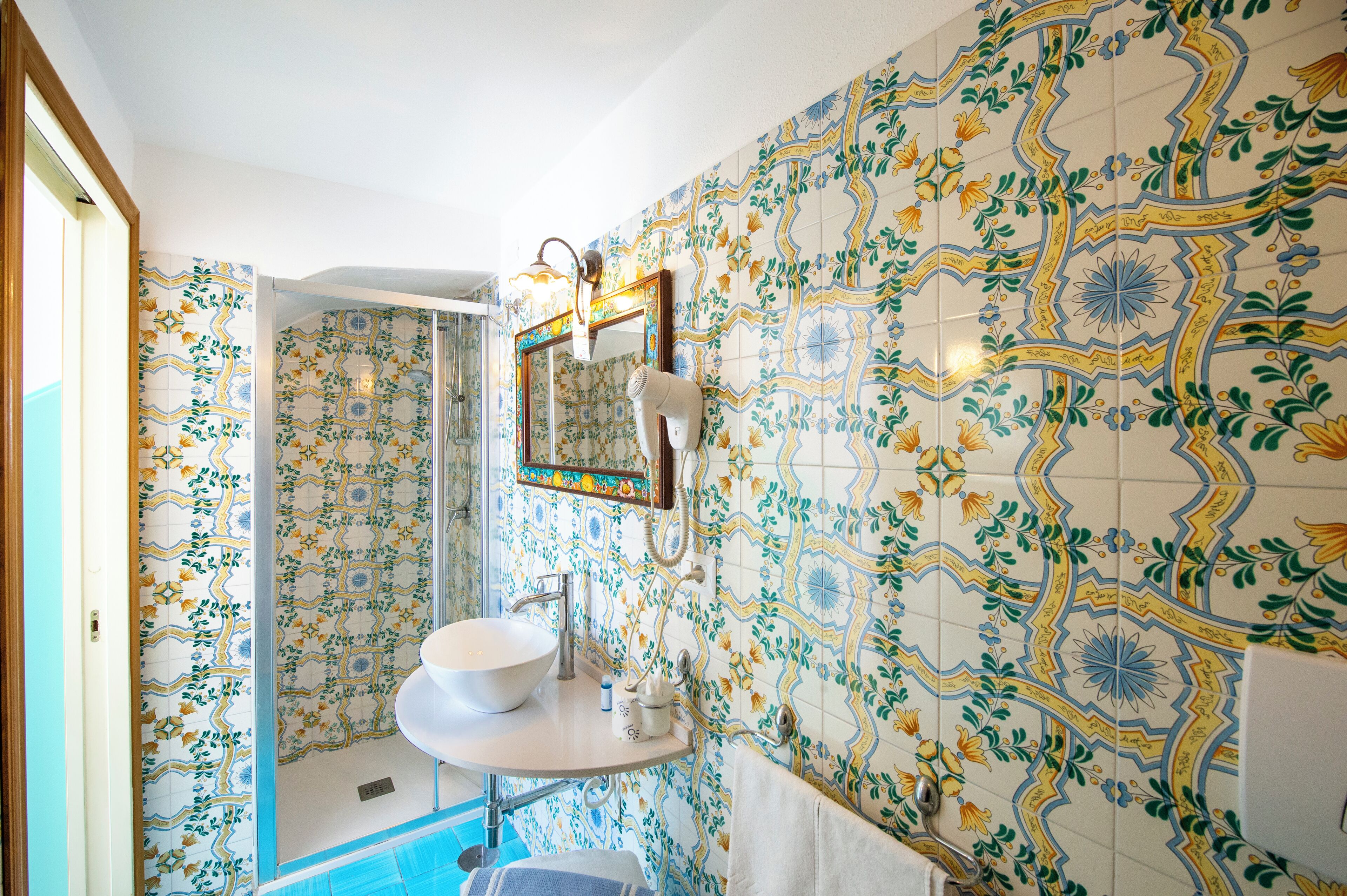 free toiletries, hair dryer, bidet, towels