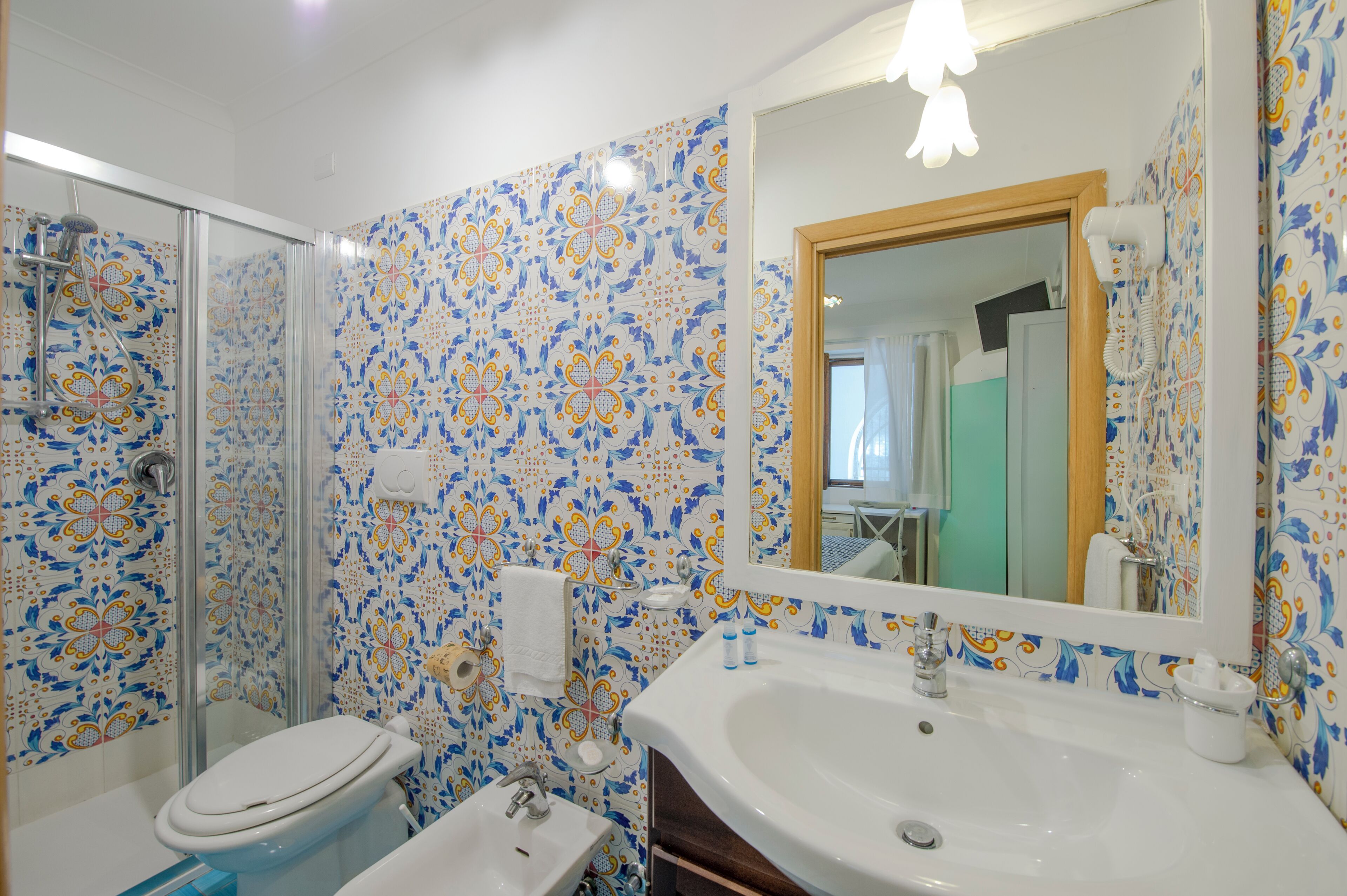 free toiletries, hair dryer, bidet, towels