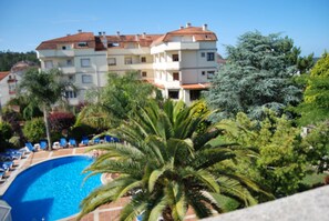 Indoor pool, seasonal outdoor pool, pool umbrellas, sun loungers