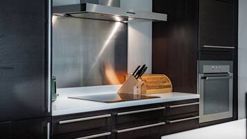 Lägenhet Junior - 3 sovrum - terrass - utsikt mot bergen | Eget kök | Stort kylskåp, ugn, spishäll och diskmaskin