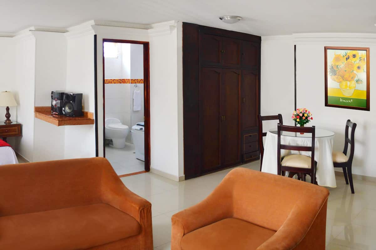Junior Suite | 1 bedroom, in-room safe, desk, blackout curtains