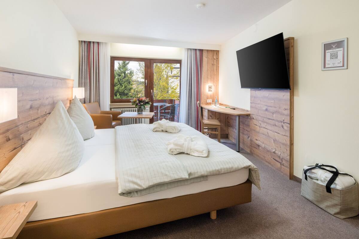 Chambre Double Confort | Coin séjour