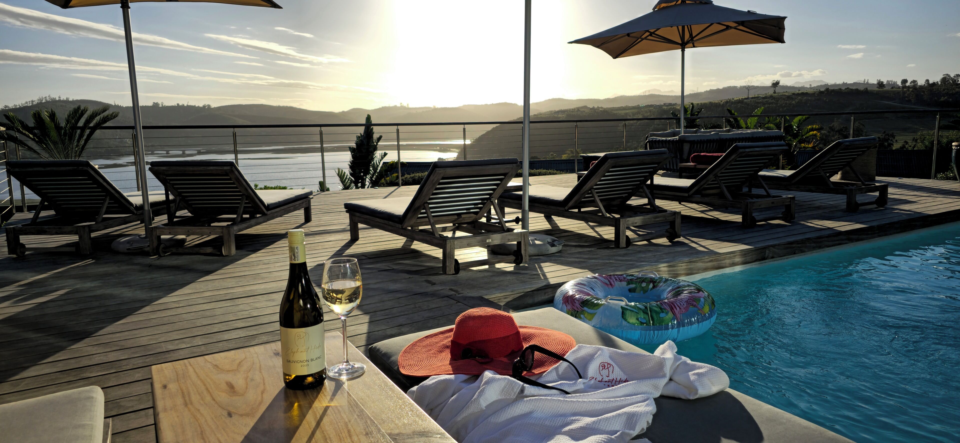 Outdoor pool, pool umbrellas, sun loungers